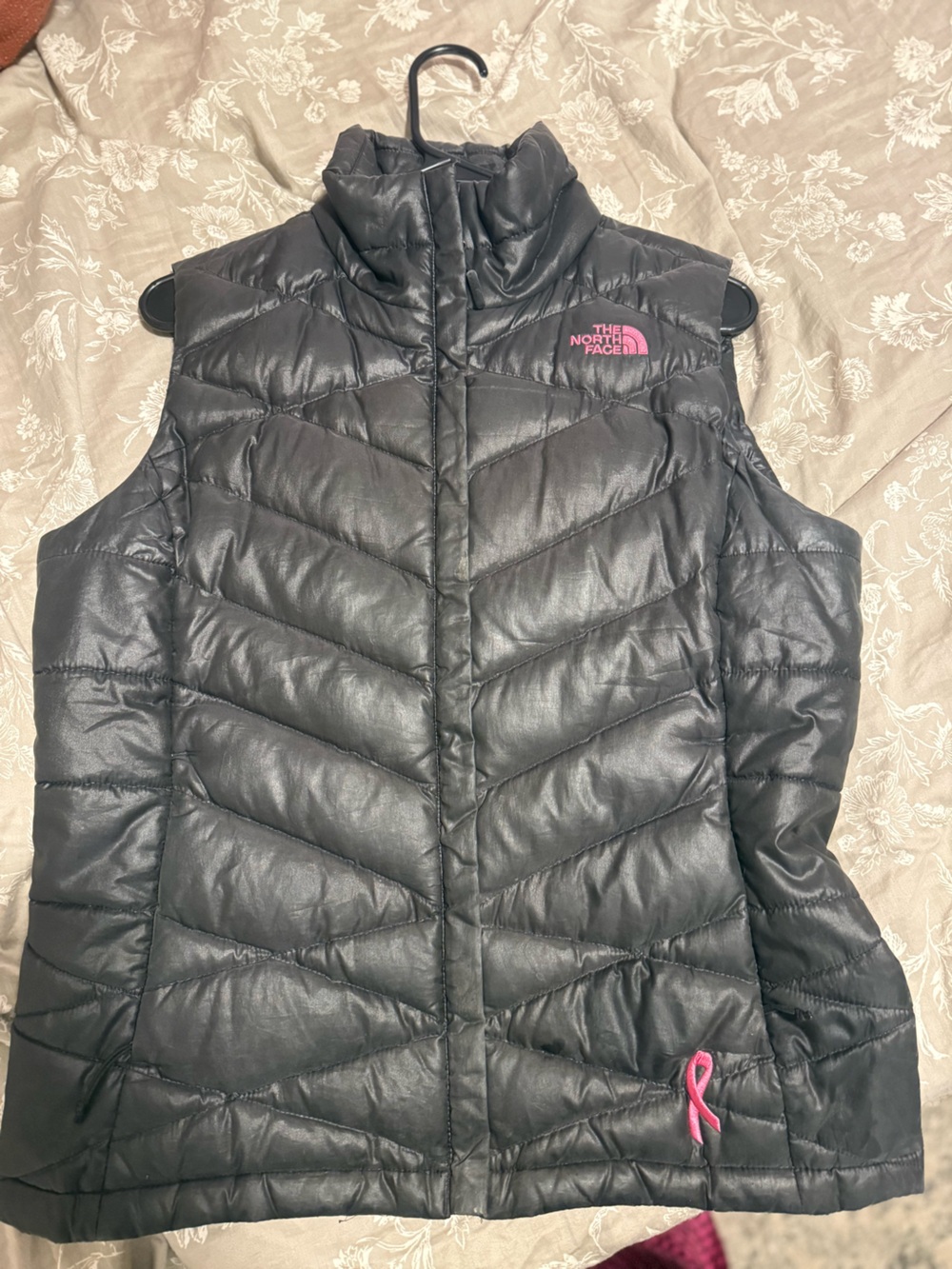 The North Face Black Puffer Vest with Pink Logo